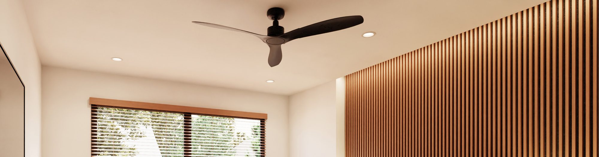 Living room with recessed downlights, a wood slat wall and a ceiling fan