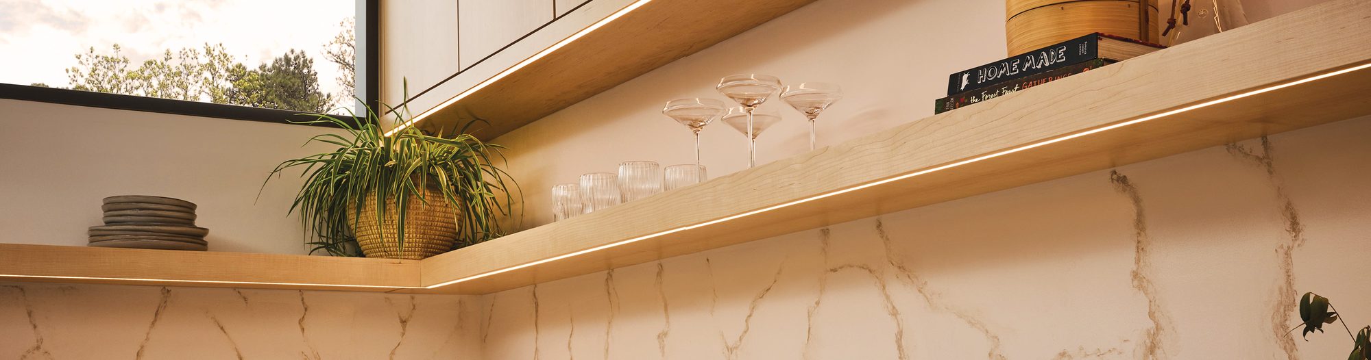 Floating shelf with warm hidden tape light