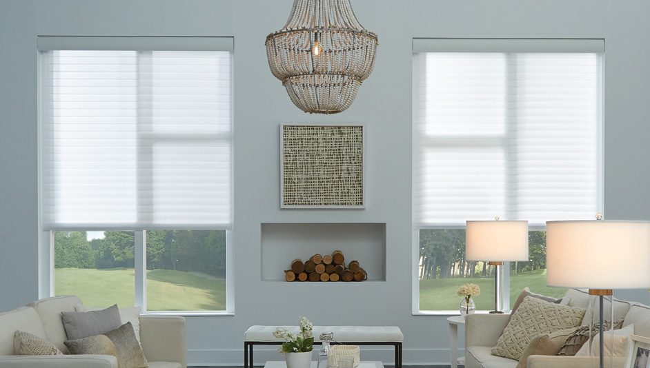 Horizontal sheer blinds by Lutron in a furnished room