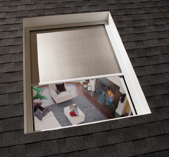 Skylight shades by Lutron in a furnished room